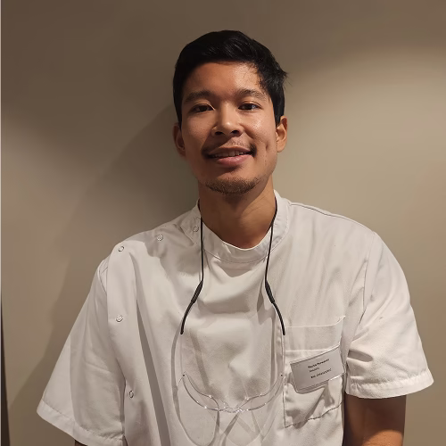 Paulus, employed at Dental Center Netherlands, smiling