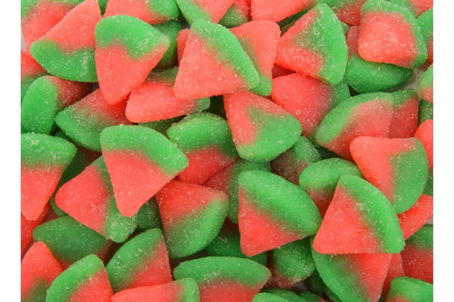 Close-up van kleurrijke gesuikerde snoepjes in fruitvorm